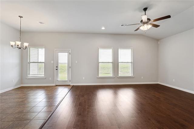 324 Ashton Oaks Ln, Luling, LA 70070 - unfurnished room with a chandelier, baseboards, a ceiling fan, dark wood-type flooring, and vaulted ceiling