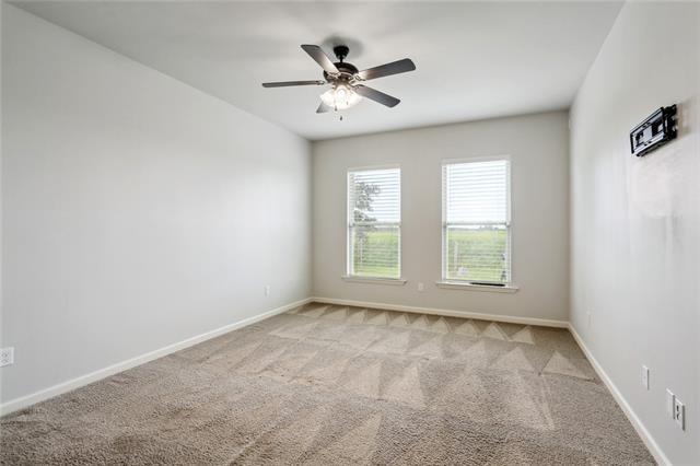 324 Ashton Oaks Ln, Luling, LA 70070 - spare room featuring light colored carpet, ceiling fan, and baseboards