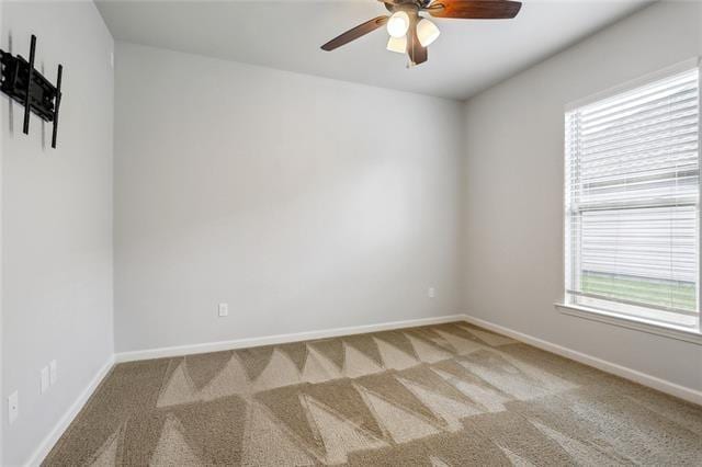 324 Ashton Oaks Ln, Luling, LA 70070 - empty room with carpet floors, ceiling fan, and baseboards