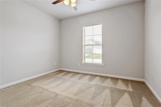 324 Ashton Oaks Ln, Luling, LA 70070 - unfurnished room with ceiling fan, healthy amount of natural light, light colored carpet, and baseboards