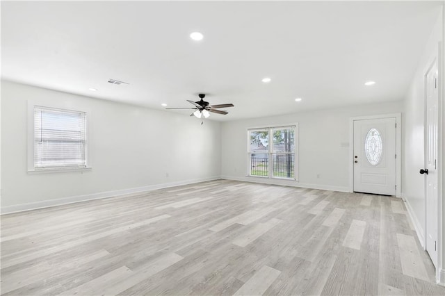 unfurnished living room with recessed lighting, ceiling fan, visible vents, and light wood finished floors