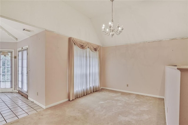 carpeted spare room with an inviting chandelier, tile patterned flooring, visible vents, baseboards, and vaulted ceiling