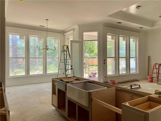 4141 Endor Loop, Mandeville, LA 70448 - kitchen featuring a sink, decorative light fixtures, unfinished concrete floors, and ornamental molding