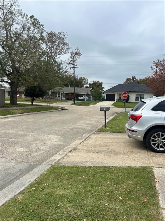 5 Daffodil St, Waggaman, LA 70094 - view of street featuring traffic signs
