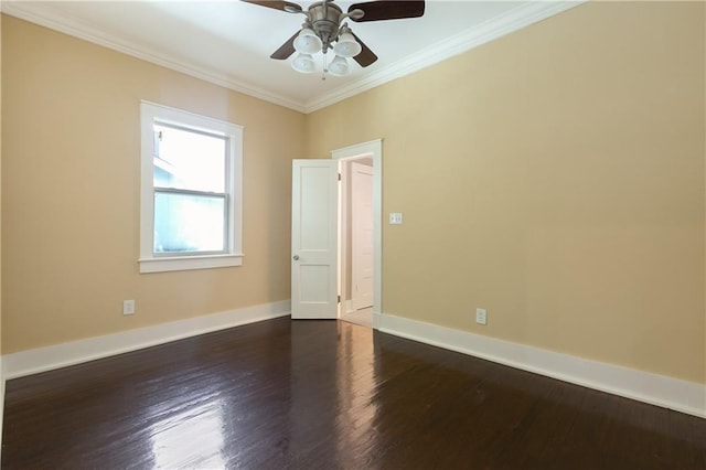 unfurnished room with crown molding, baseboards, ceiling fan, and dark wood-style flooring