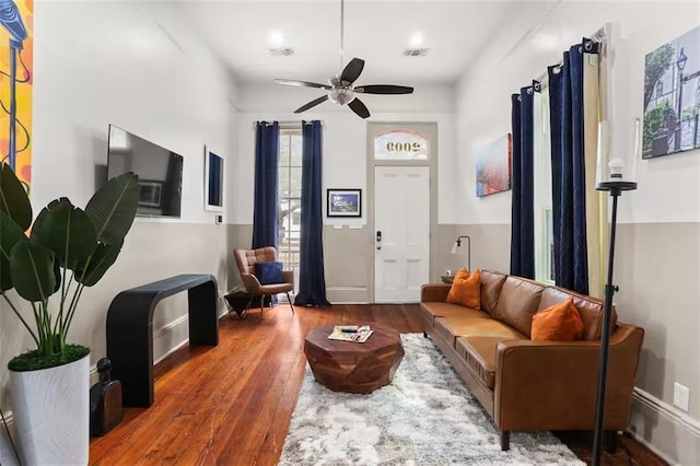 2009-11 N Claiborne Ave, New Orleans, LA 70116 - living area with visible vents, a ceiling fan, and hardwood / wood-style flooring