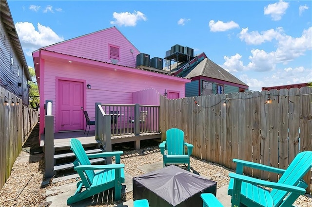 2009-11 N Claiborne Ave, New Orleans, LA 70116 - view of patio / terrace with a fenced backyard and a wooden deck