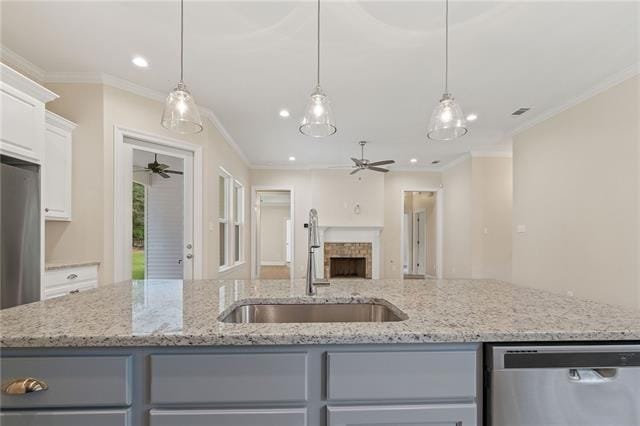 166 Egret St, Covington, LA 70433 - kitchen featuring dishwasher, ceiling fan, a sink, ornamental molding, and gray cabinets