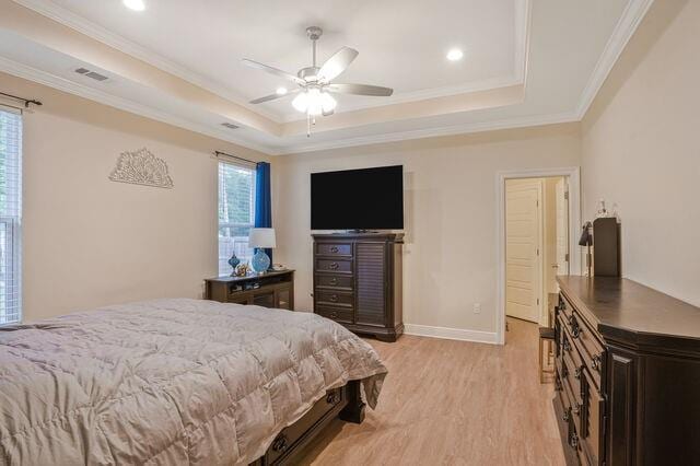 166 Egret St, Covington, LA 70433 - bedroom featuring a raised ceiling, light wood-type flooring, ornamental molding, recessed lighting, and baseboards