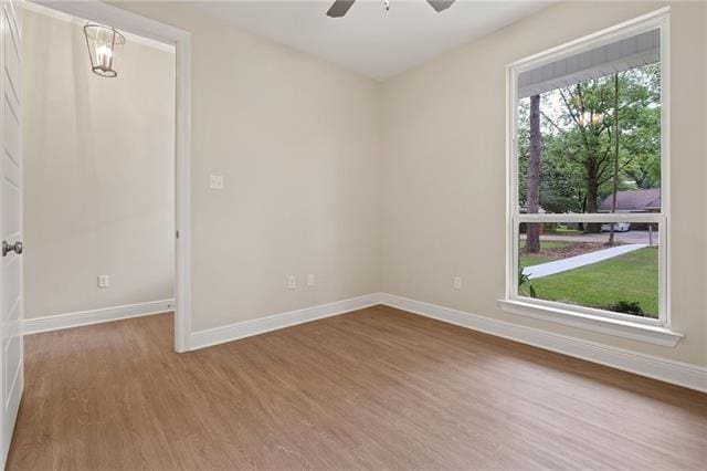 166 Egret St, Covington, LA 70433 - spare room featuring wood finished floors, baseboards, and a ceiling fan