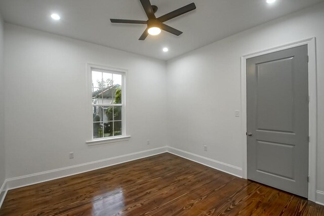 unfurnished room featuring recessed lighting, ceiling fan, dark wood-style floors, and baseboards