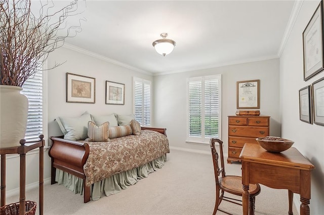 carpeted bedroom with baseboards and ornamental molding