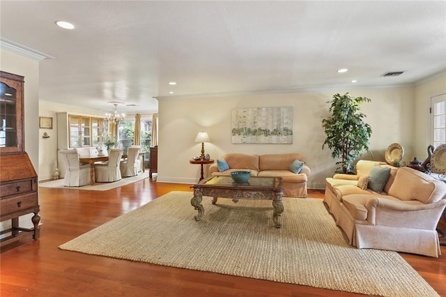 3705 Clifford Dr, Metairie, LA 70002 - living room featuring crown molding, a notable chandelier, visible vents, and a wealth of natural light