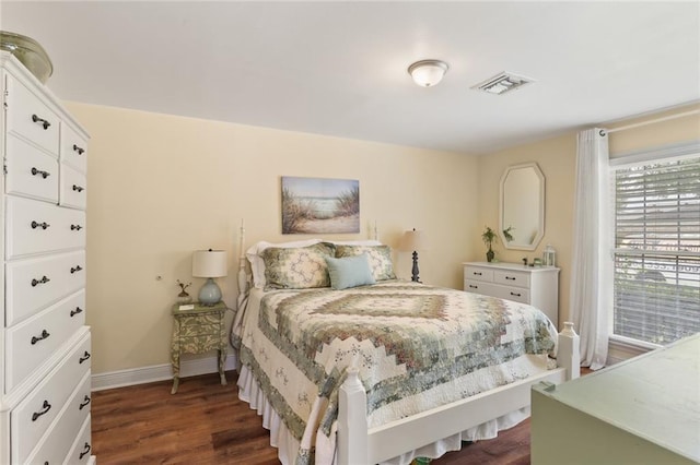 3705 Clifford Dr, Metairie, LA 70002 - bedroom featuring baseboards, visible vents, and dark wood finished floors