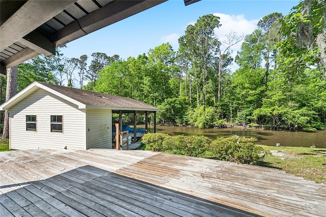 wooden terrace with a water view