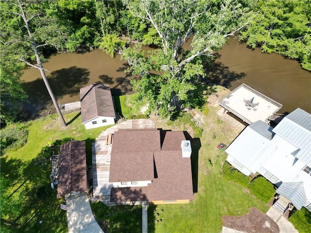 birds eye view of property featuring a water view