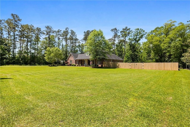 view of yard with fence