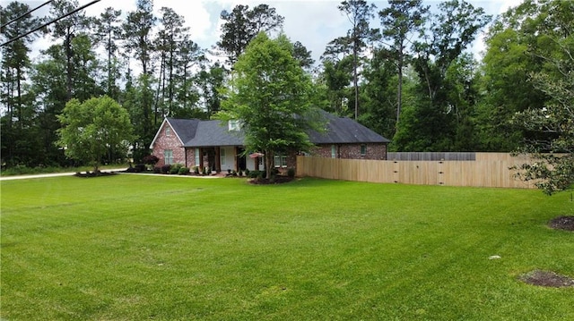 view of yard with fence