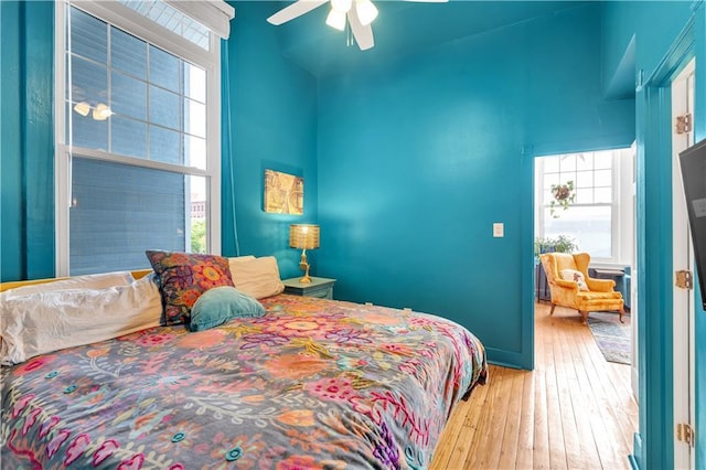 4716 Annunciation St Unit 2E, New Orleans, LA 70115 - bedroom featuring a ceiling fan and hardwood / wood-style floors