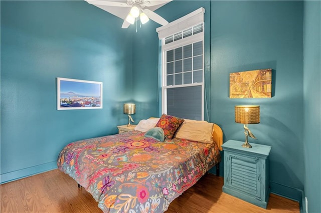 4716 Annunciation St Unit 2E, New Orleans, LA 70115 - bedroom featuring baseboards, ceiling fan, and wood finished floors