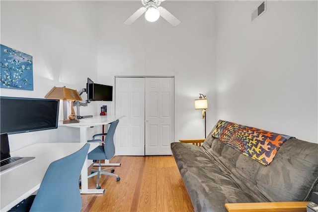 4716 Annunciation St Unit 2E, New Orleans, LA 70115 - office space with ceiling fan, a high ceiling, light wood-style flooring, and visible vents