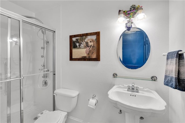 4716 Annunciation St Unit 2E, New Orleans, LA 70115 - full bath with a sink, baseboards, a shower stall, and toilet