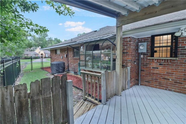deck with a fenced backyard