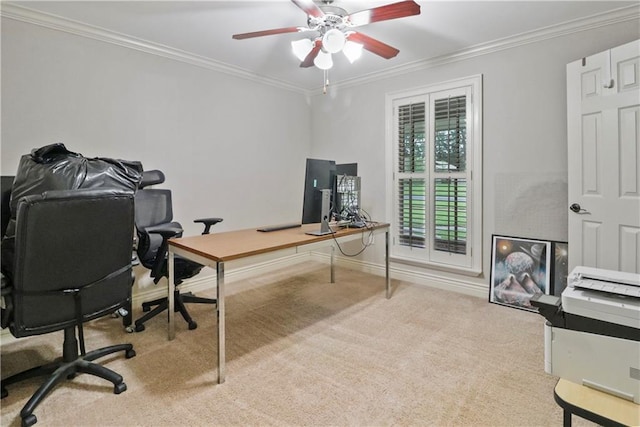 carpeted office featuring crown molding, baseboards, and ceiling fan