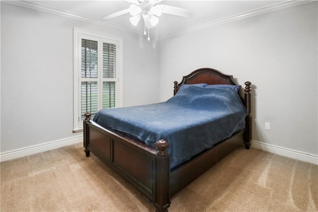 bedroom featuring crown molding, baseboards, light carpet, and ceiling fan