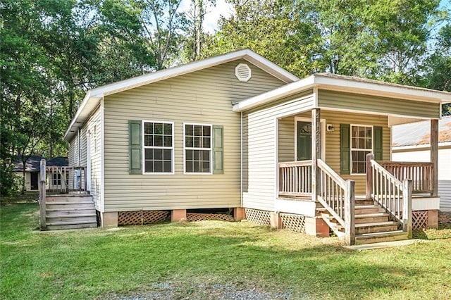 21221 Fern St, Covington, LA 70435 - exterior space featuring a porch, a front lawn, and stairway