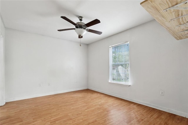 21221 Fern St, Covington, LA 70435 - empty room featuring baseboards, light wood-style flooring, and ceiling fan