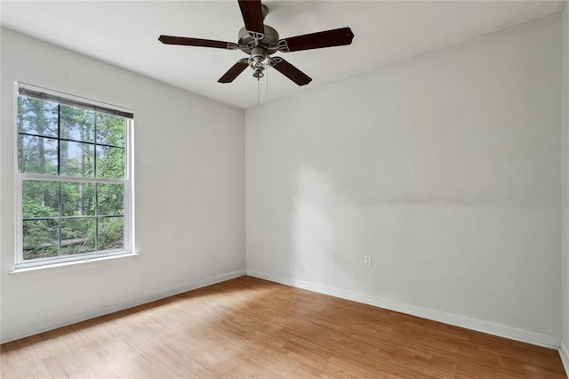 21221 Fern St, Covington, LA 70435 - empty room with baseboards, a ceiling fan, and light wood finished floors