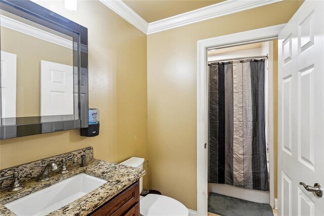 3808 Thomas Dr, Slidell, LA 70458 - full bathroom with toilet, ornamental molding, a shower with shower curtain, and vanity