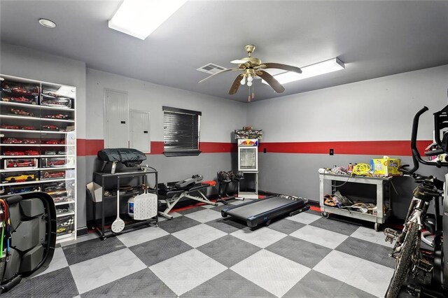 3808 Thomas Dr, Slidell, LA 70458 - exercise room featuring ceiling fan, visible vents, tile patterned floors, and electric panel
