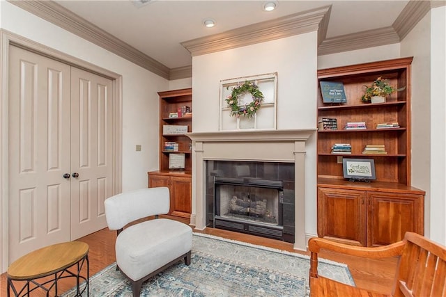 14208 W Hoffman Rd, Hammond, LA 70403 - sitting room with ornamental molding, a fireplace, recessed lighting, and wood finished floors