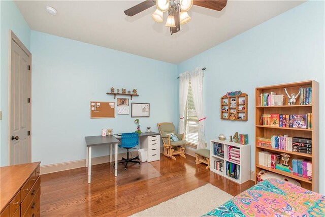 14208 W Hoffman Rd, Hammond, LA 70403 - bedroom with baseboards, a ceiling fan, and wood finished floors