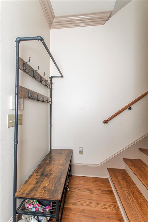 14208 W Hoffman Rd, Hammond, LA 70403 - interior space featuring baseboards, ornamental molding, and wood finished floors