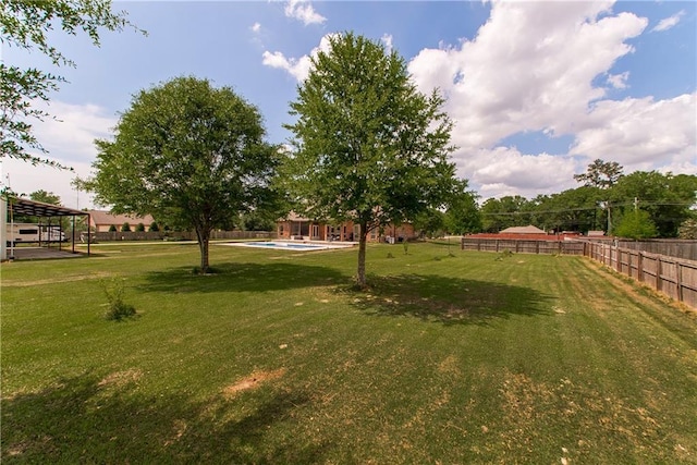 14208 W Hoffman Rd, Hammond, LA 70403 - view of yard with a fenced in pool and fence