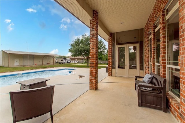 14208 W Hoffman Rd, Hammond, LA 70403 - pool featuring a patio area and french doors