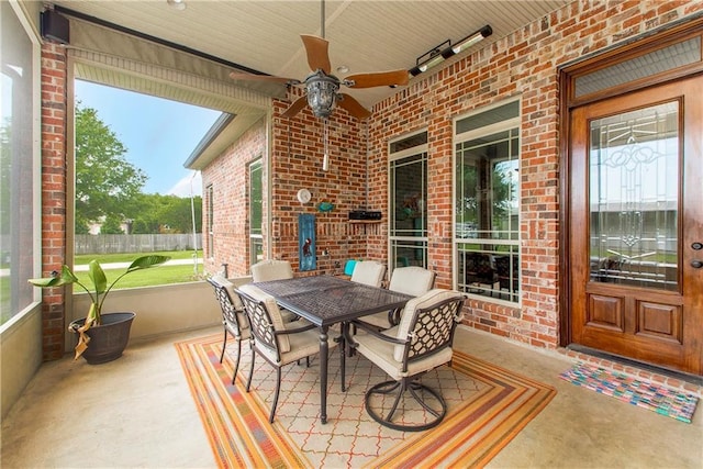 14208 W Hoffman Rd, Hammond, LA 70403 - exterior space featuring outdoor dining area, ceiling fan, and fence