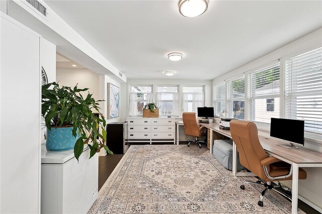 office space featuring visible vents