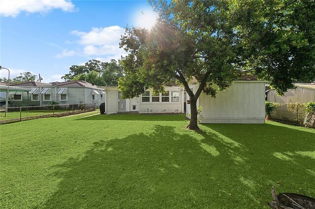view of yard with fence