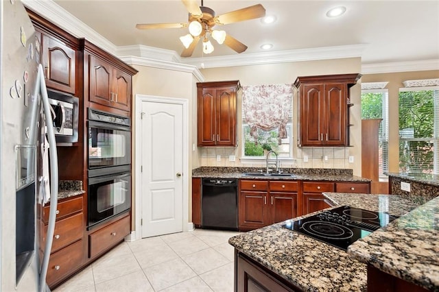 1045 Whitetail Dr, Mandeville, LA 70448 - kitchen featuring black appliances, a sink, plenty of natural light, backsplash, and crown molding