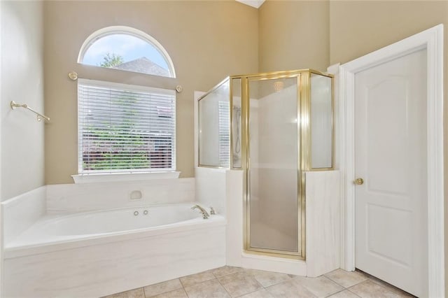 1045 Whitetail Dr, Mandeville, LA 70448 - full bathroom featuring a shower stall, tile patterned flooring, and healthy amount of natural light