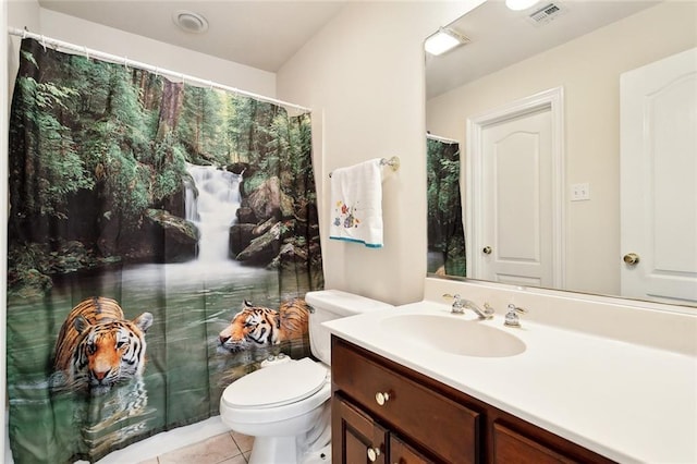 1045 Whitetail Dr, Mandeville, LA 70448 - full bathroom with vanity, toilet, and tile patterned flooring
