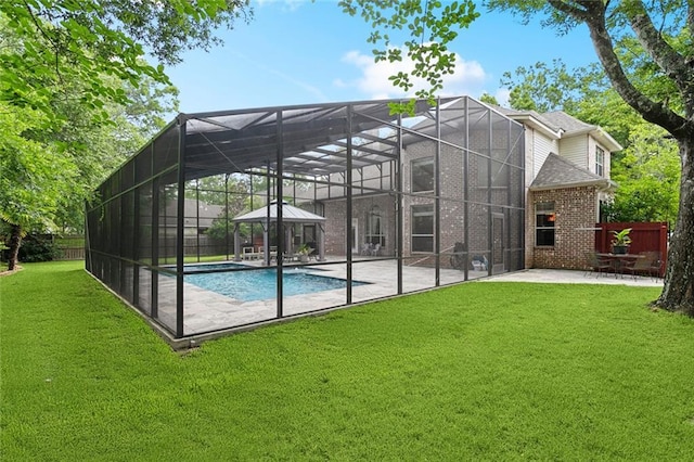 1045 Whitetail Dr, Mandeville, LA 70448 - rear view of property with a patio area, brick siding, an outdoor pool, and a lanai