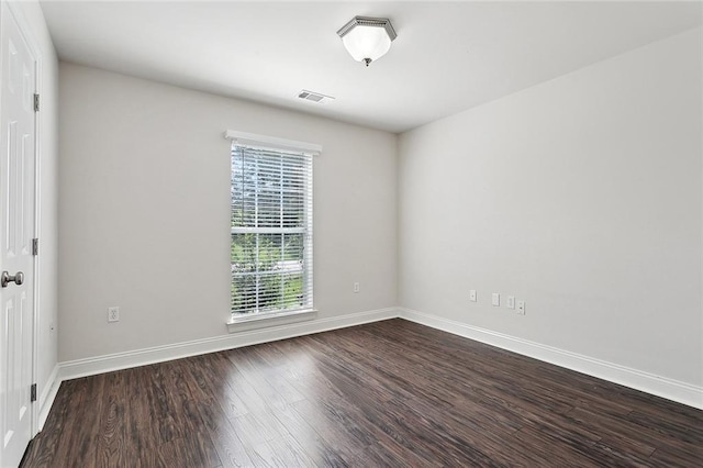 70363 10th St, Covington, LA 70433 - spare room with baseboards, visible vents, and wood finished floors
