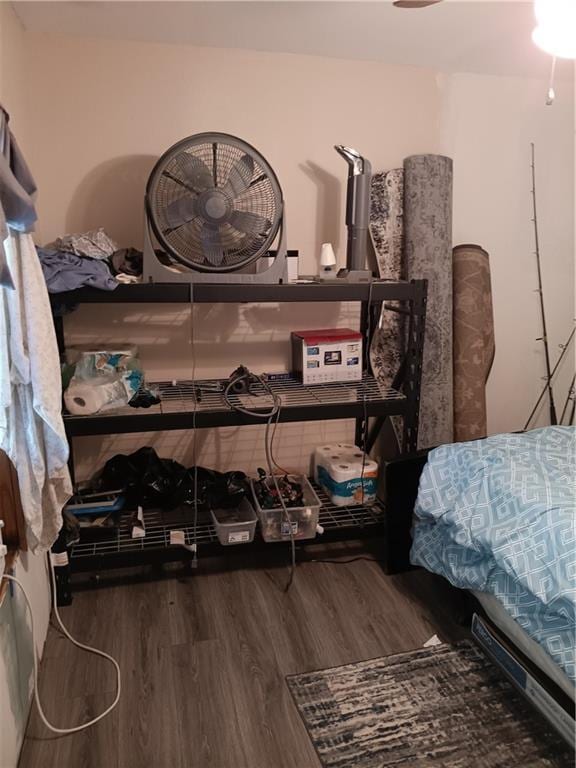 bedroom with wood finished floors