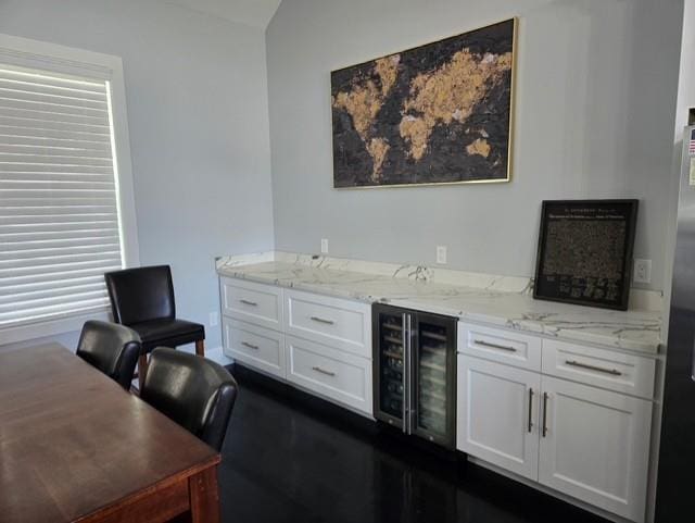 bar featuring a dry bar and wine cooler
