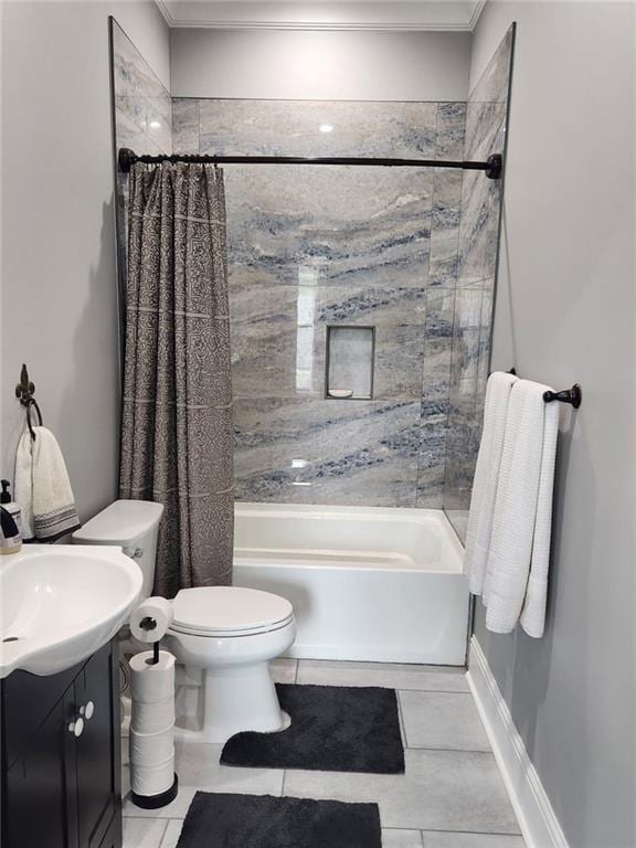 full bathroom with vanity, shower / bath combo with shower curtain, tile patterned floors, toilet, and ornamental molding